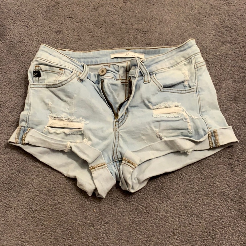 Light blue KanCan ripped jean shorts.